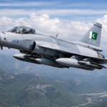 JF-17 Thunder fighter jet flying in the air with Pakistani flag logo