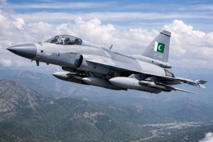 JF-17 Thunder fighter jet flying in the air with Pakistani flag logo
