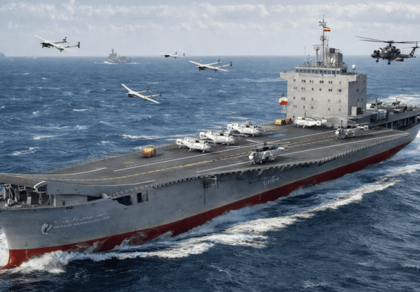 IRIS Shahid Bagheri Iranian drone carrier with helicopters and unmanned aerial systems operating at sea